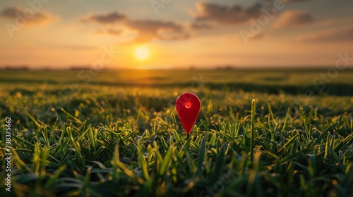 A green field basks in the glow of sunset, with a prominent big red pin marking the destination. This imagery embodies the concepts of goal-setting, dreams, reaching the end, enjoying picnics, and ach photo