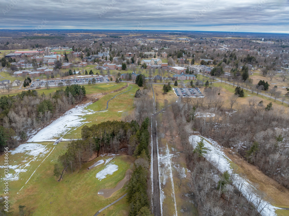 Winter aerial image of Canton, NY in St Lawrence County, on a cloudy afternoon.	