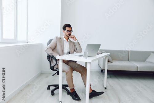 Holding businessman happy planning office company suit paper document laptop © SHOTPRIME STUDIO