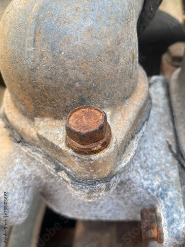 old rusty nut on the ground