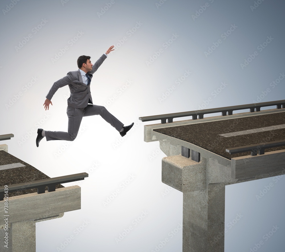 Young businessman jumping over the bridge Young businessman jumping over the bridge