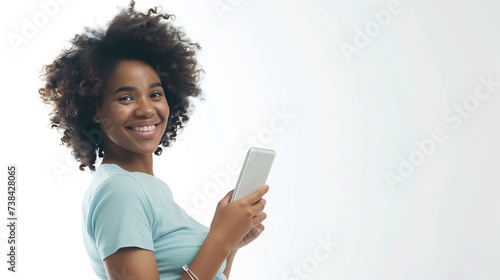 Cheerful African American with crisp hair holds modern smart phone happy to recieve message dressed in casual t shirt poses against white background with blank space for your advertise : Generative AI photo