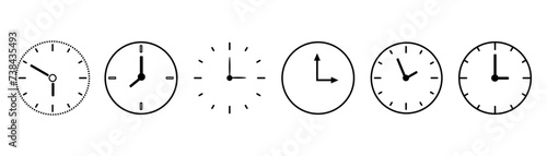 Set of different drawn clocks on white background
