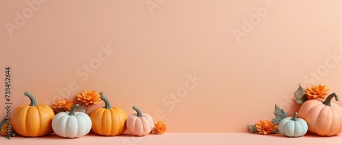trendy thanksgiving halloween background with pastel pumpkins and flowers