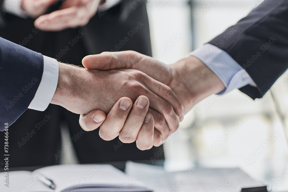 men close-up, looking in a folder with documents