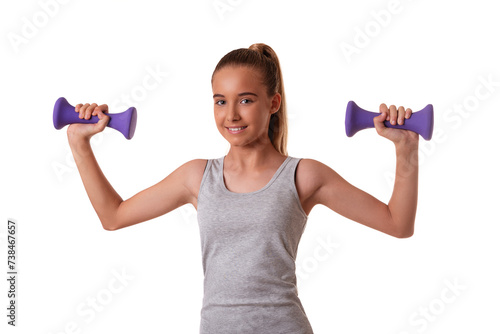 Horizontal shot of satisfied motivated teen girl has regular training raises arms with dumbbells, isolated on white. Sport concept