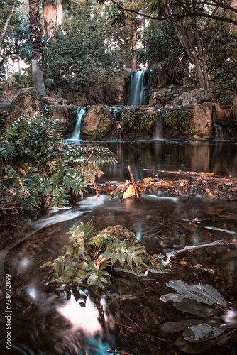 Waterfall long exposure at John Oldham Park, Perth Western Australia. Landscape photography of running water, waterfalls, nature, autumn, lake