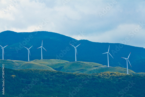 Electric wind turbine Lanscapes on the way to Mount Aso in Kumamoto prefecture, Kyushu, Japan.