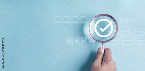 aim, marketing, success, target, career, challenge, competition, development, goal, performance. magnifying glass focus to checklist assignment to target objective. planning strategy to development. photo