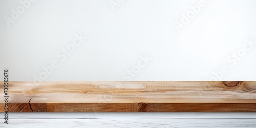 Wooden table top on abstract white background, panoramic banner - suitable for showcasing or creating product collages.