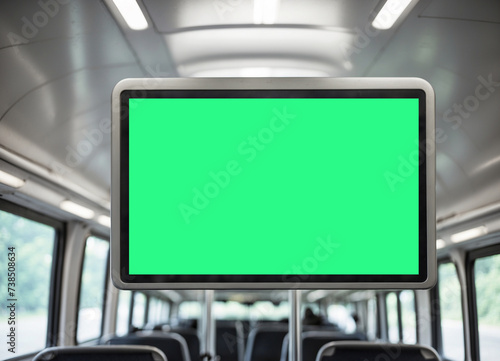 information board in the bus cabin. selective focus. advertising in public transport. screen on the bus, a place for advertising.