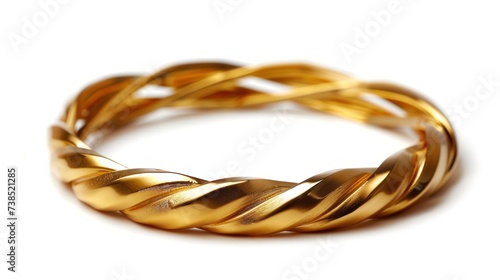 Gold bangle bracelet isolated on white background.