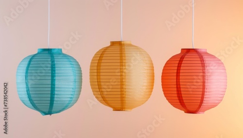 Three traditional paper lanterns are hanging against a light background, featuring neo-geo minimalism, smilecore, and boldly textured surfaces