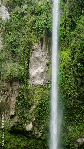 Tallest falls in Camiguin Island, the Katibawasan Falls. Philippines. Vertical video. photo