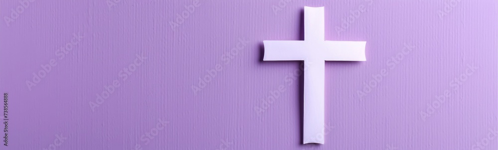 Christian cross isolated on purple color background Christian cross isolated on purple color background
