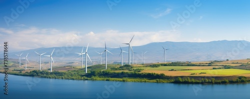 Wind turbines in beautiful landscape  production of clean and renewable energy  renewable and green energy concept