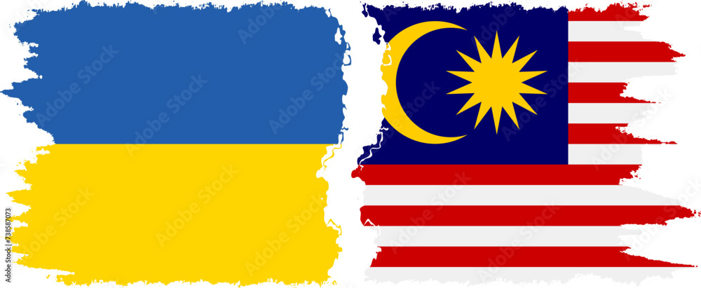 Obraz premium Malaysia and Ukraine grunge flags connection vector