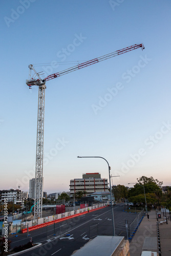 crane on a construction site at dusk photo