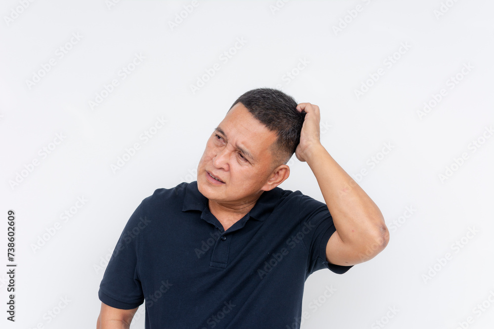 Middle aged Asian man showing anxiety and concern, scratching his head in worry. Isolated on a white background. Middle aged Asian man showing anxiety and concern, scratching his head in worry. Isolated on a white background.