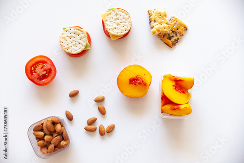 healthy snack foods laid out on white bench photo