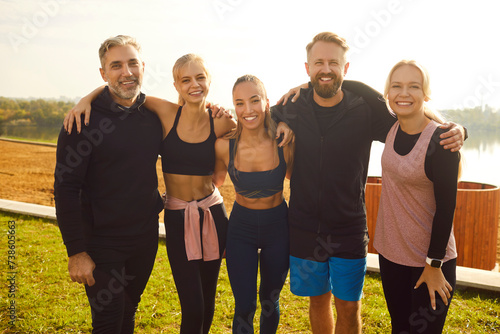 Fototapeta Naklejka Na Ścianę i Meble -  Sport people portrait, small group personal training, individual and team athletic performance. Active men, women posing after running, before marathon, fitness professional, friends recreation club