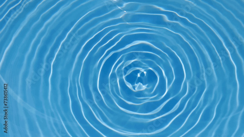 Blue water surface texture with ripples, splashes, and bubbles. Abstract summer banner background Water waves in sunlight with copy space cosmetic moisturizer micellar toner emulsion. Blue water wave.