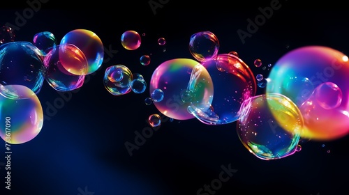 Rainbow soap bubbles on a dark background © Elchin Abilov