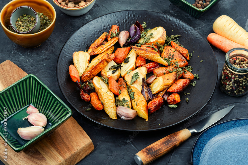 Roasted parsnip root and carrots. Roasted parsnip root and carrots.
