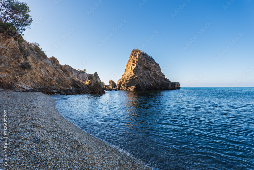 Cañuelo Beach, a cove in the Maro-Cerro Gordo Cliffs natural area, in the municipality of Nerja, Malaga.