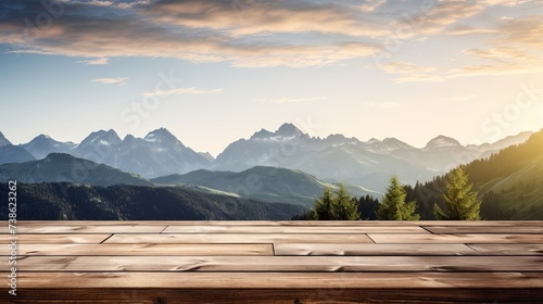 Wooden table top with the mountain landscape photo