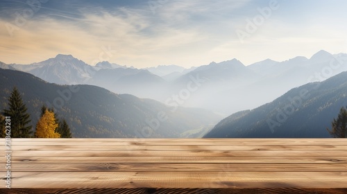 Wooden table top with the mountain landscape photo