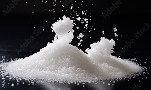 A Sweet Stack of White Sugar on a Table photo