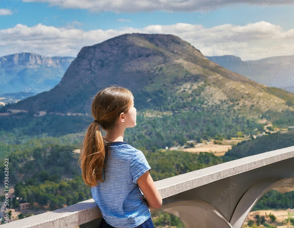 girl looking at the distant mountains