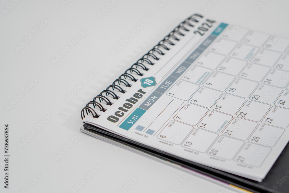 Fototapeta premium 2024 Calendar. A portable calendar of 2024, the page of October isolated on white background.