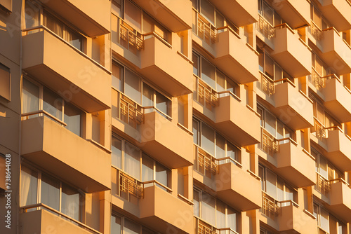 Close up of the facade of a modern apartment building with balconies