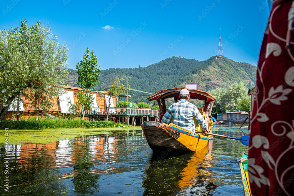 Dal Lake and the beautiful mountain range in the background in the summer Boat Trip of city Srinagar Kashmir India.	