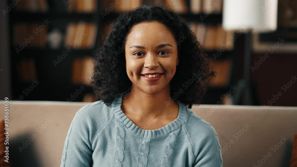 African american smiling girl portrait. Close up beautiful teenage female student with smile, looking confident, have a beauty curly hairstyle. African American beauty, education student concept. African american smiling girl portrait. Close up beautiful teenage female student with smile, looking confident, have a beauty curly hairstyle. African American beauty, education student concept.