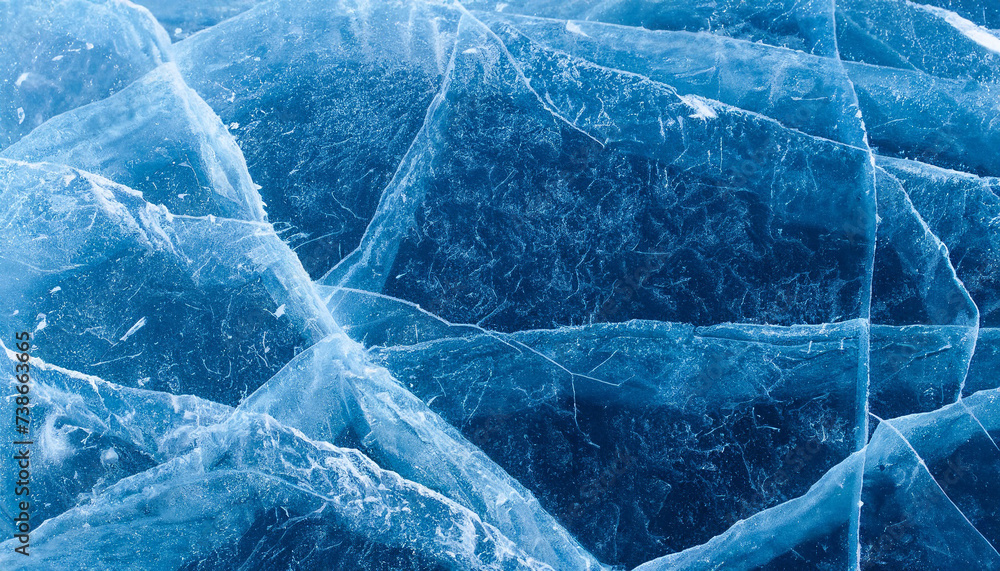 Abstract ice background. Blue background with cracks on the ice surface Abstract ice background. Blue background with cracks on the ice surface