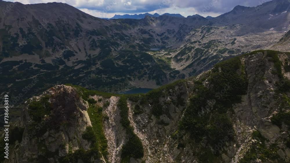 Aerial drone landscape shot of Ribnoto-Banderishko lake and mountaintops in Pirin mountain national park. Aerial drone landscape shot of Ribnoto-Banderishko lake and mountaintops in Pirin mountain national park.