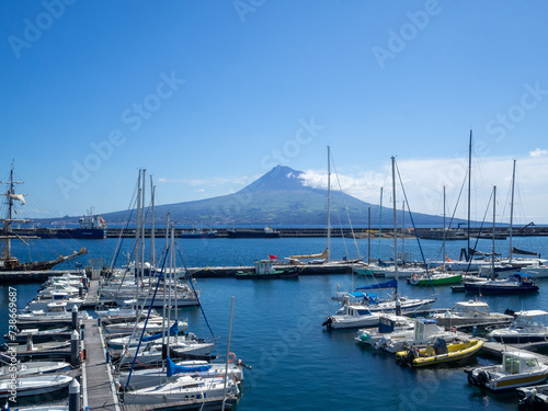Pico Mountain behind the sailboats in Horta marina photo