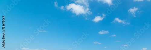 Small clouds in the blue sky