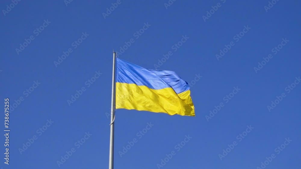 Flag of Ukraine against the blue sky. Flag of Ukraine against the blue sky.