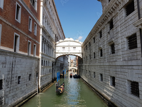 Gondolas on a canal under the Bridge of Sighs in Venice