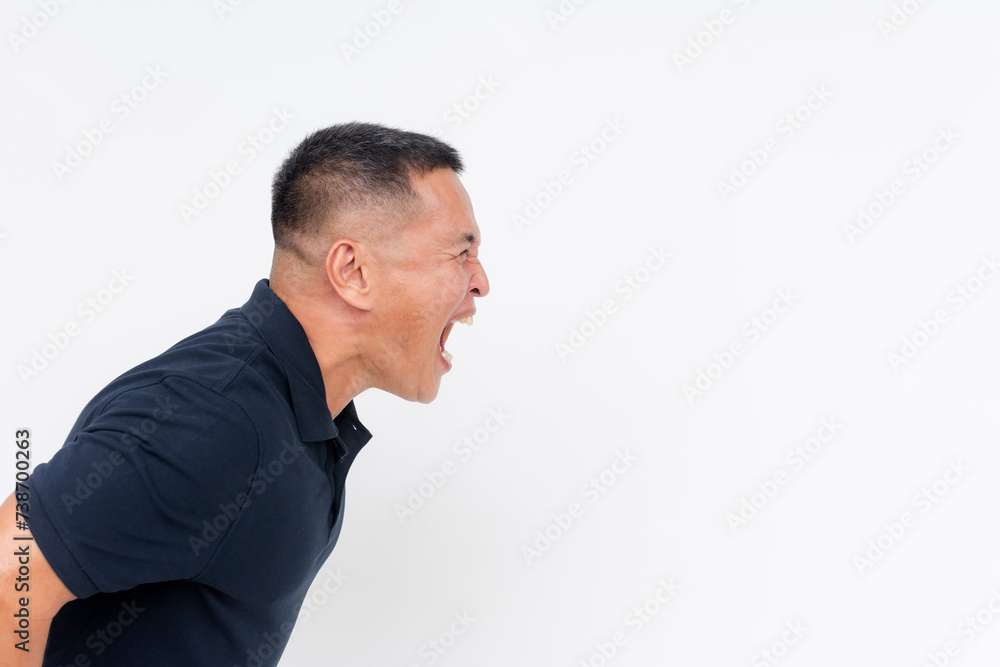 Side view of an angry middle aged asian man screaming from the top of his lungs. Copyspace on the right, on a white background. Side view of an angry middle aged asian man screaming from the top of his lungs. Copyspace on the right, on a white background.