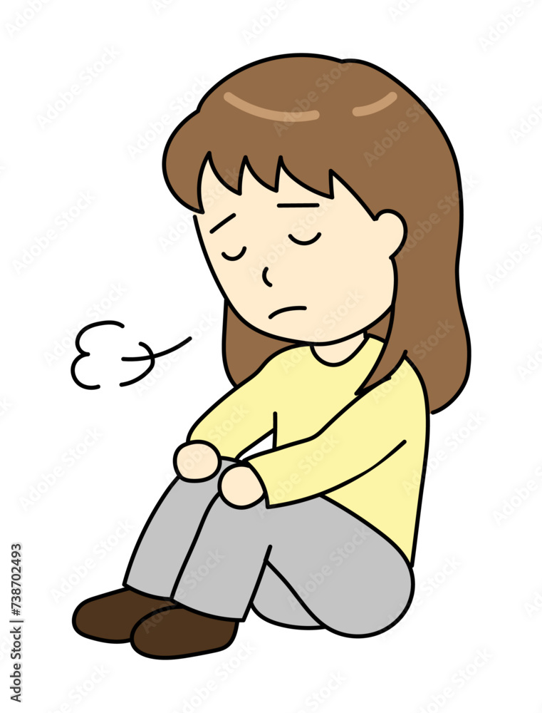 体育座りでため息をつくうつ病の若い女性 体育座りでため息をつくうつ病の若い女性