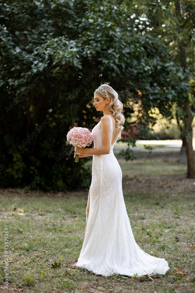 bride in wedding dress with bouquet