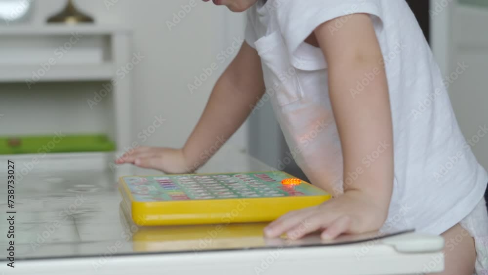 child learning alphabet on smarty alphabet tablet to learn letters, ABC, numbers, shapes, colors, music and words. Interactive toddler learning and education toys for kids boys and girls child learning alphabet on smarty alphabet tablet to learn letters, ABC, numbers, shapes, colors, music and words. Interactive toddler learning and education toys for kids boys and girls