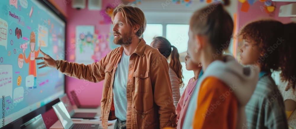 Obraz premium Interactive Learning with Tech-Savvy Teacher in Classroom