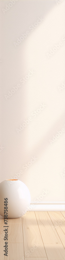 Round white ceramic vase sits on wooden floor against eggshell colored wall Round white ceramic vase sits on wooden floor against eggshell colored wall