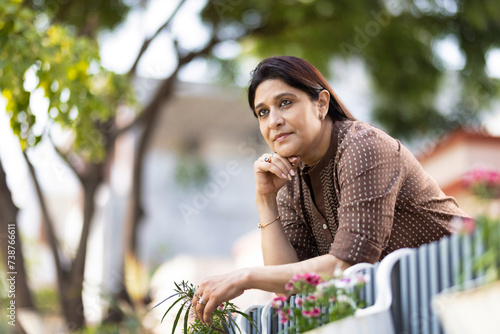Photography Portrait of cheerful woman enjoying autumn